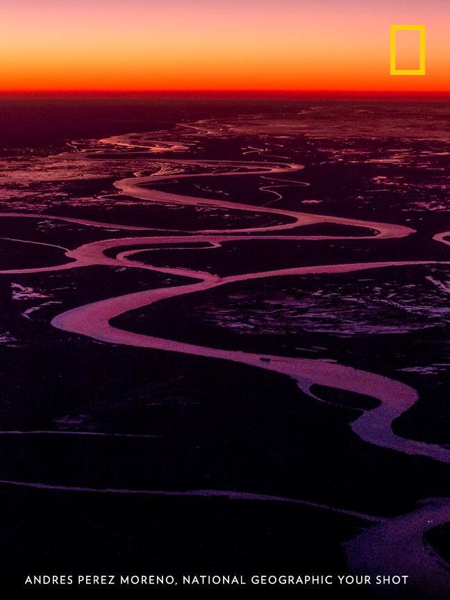 Sunset illuminates the Paraná Delta in this gorgeous scene captured by Your Shot photographer Andres Perez Moreno. "This dynamic ecosystem is submitted to constant floods, and is very rich in biodiversity." https://on.natgeo.com/2YP47Wj