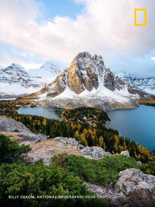 "Got up for sunrise to hike up to the Niblet in Mount Assiniboine Provincial Park for this shot," writes Your Shot photographer Billy Dekom. "Suddenly the clouds started to clear and I could see Sunburst Peak along with Sunburst Lake and Cerulean Lake clearly across the way." https://on.natgeo.com/34imPVV